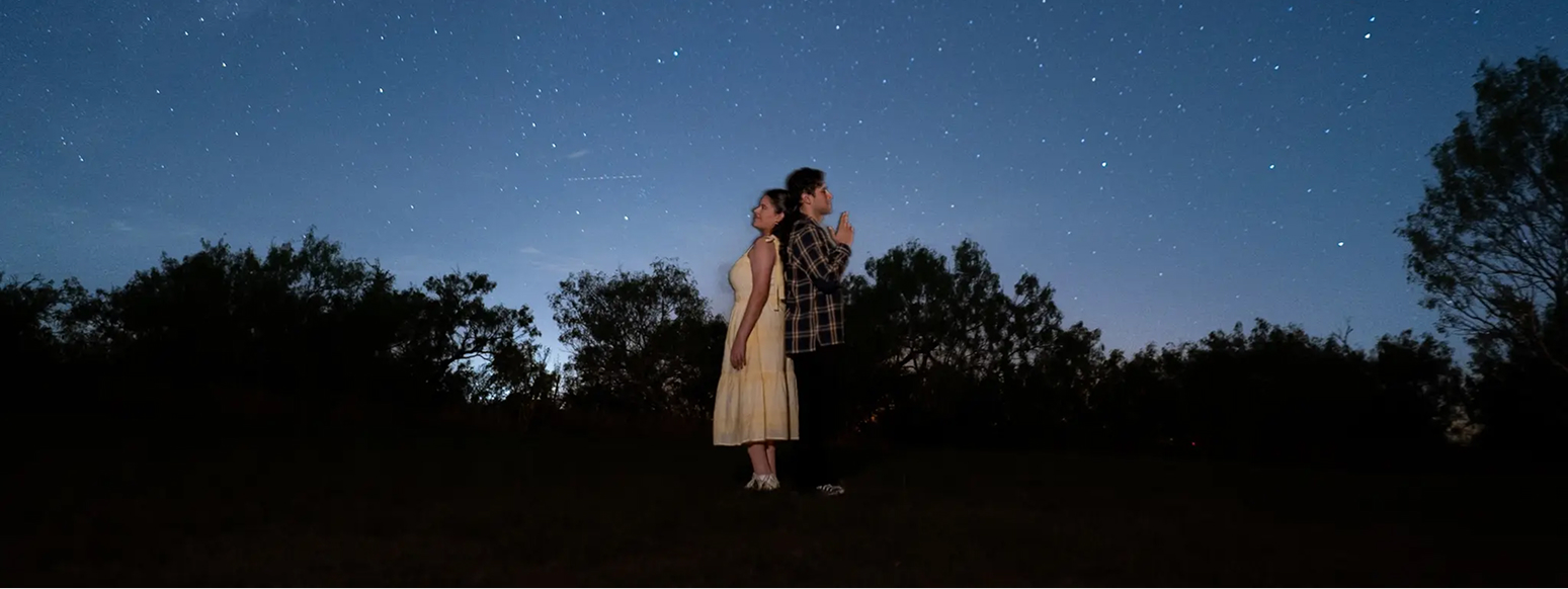 Romantic night engagement session under the stars