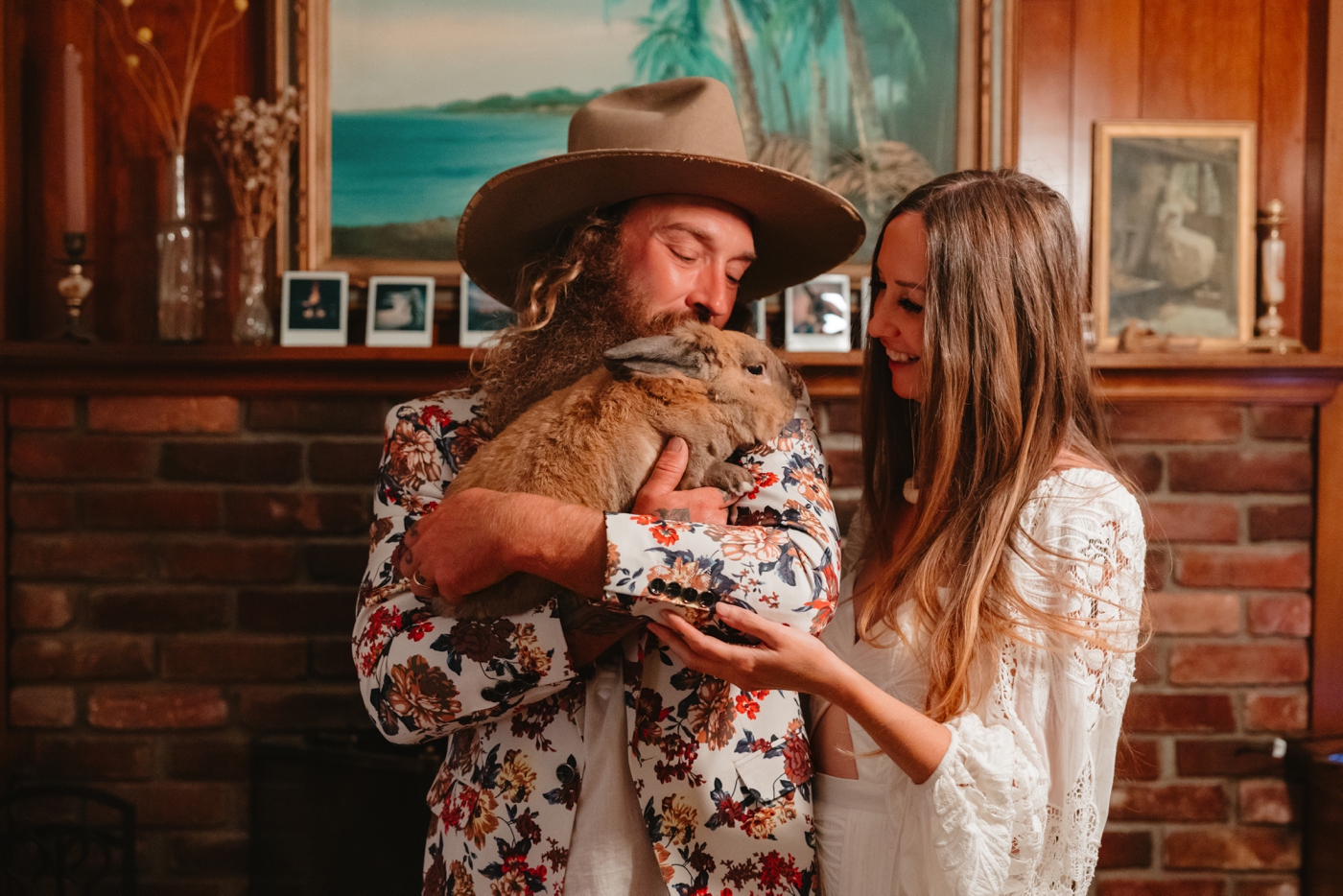 Bride and groom with their pet bunny