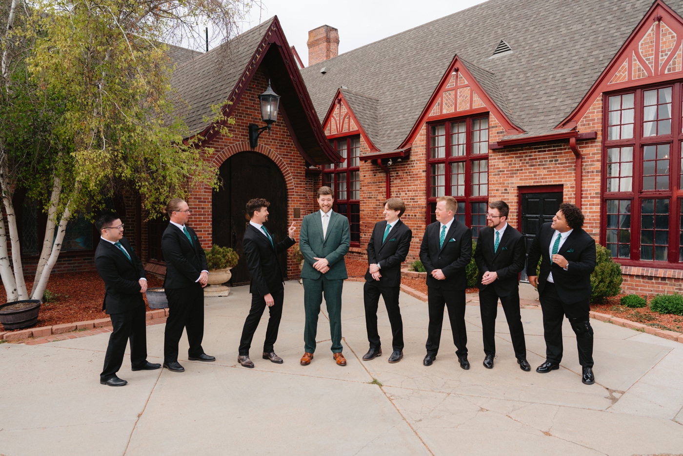 Candid portrait of groom and groomsmen