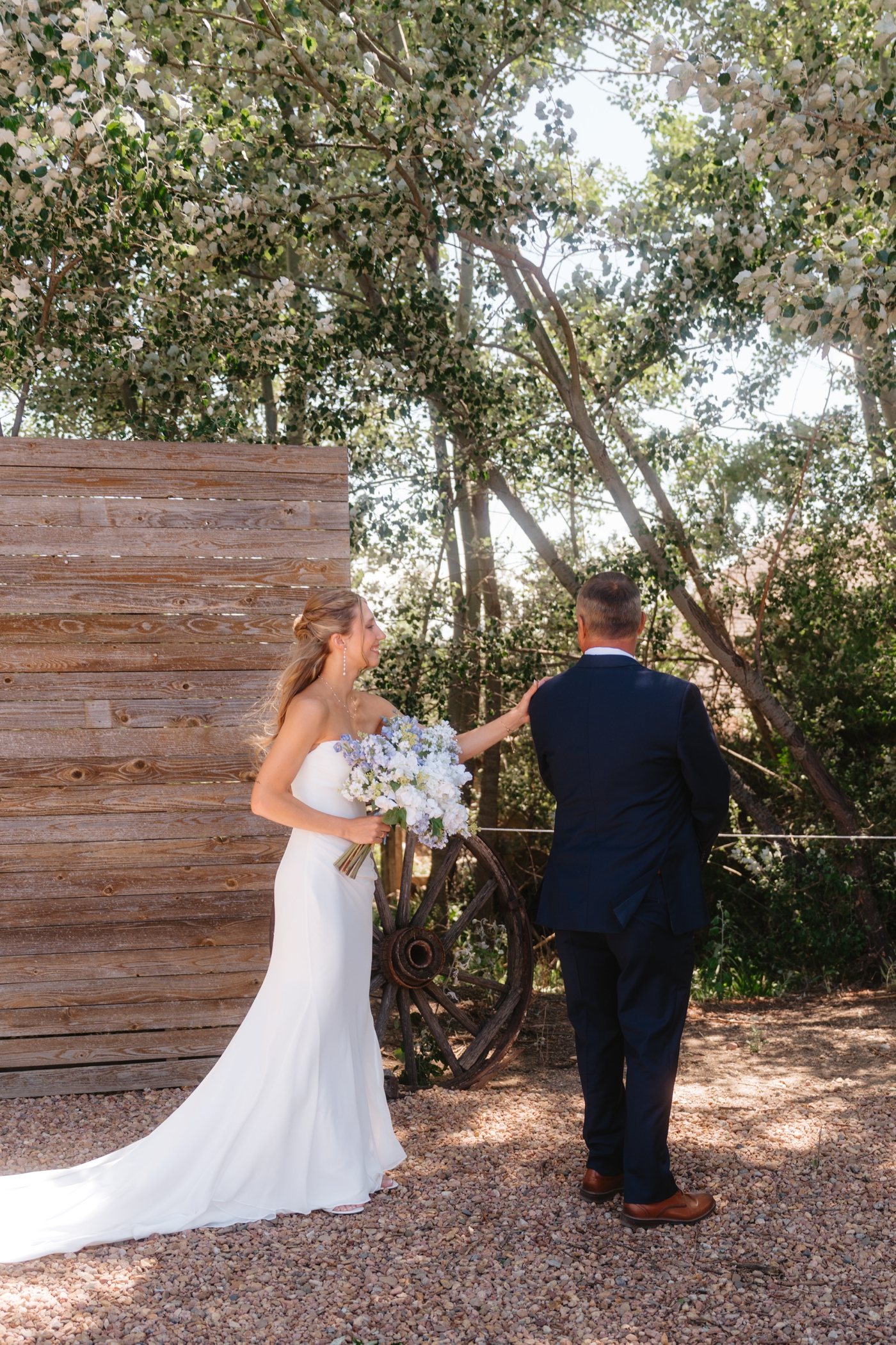 First look with father and bride at Rockin' S Ranch