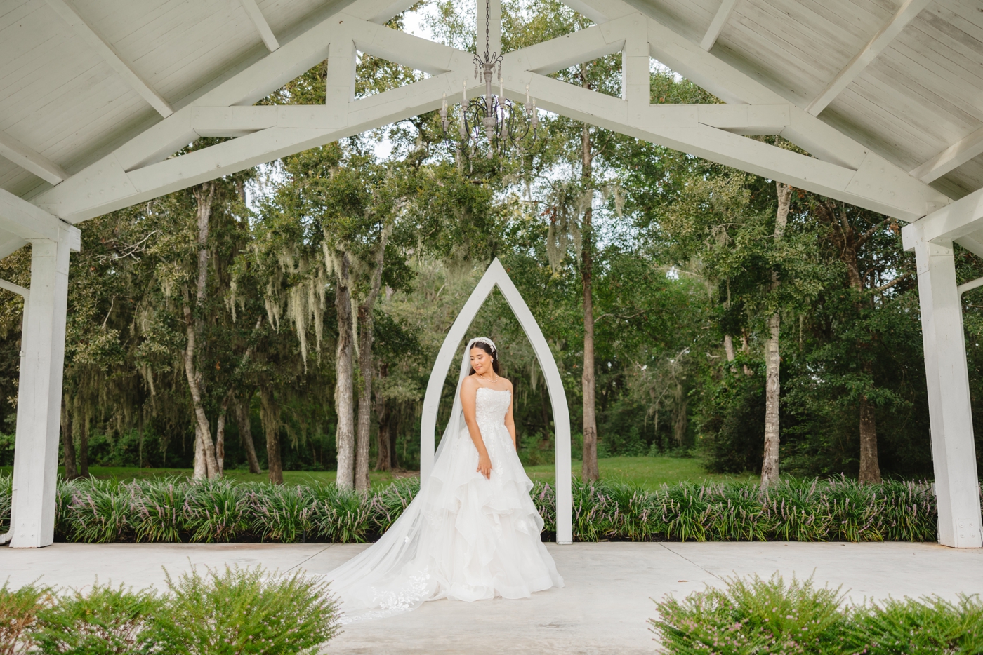 Bride in the outdoor ceremony space at The Springs in Wallisville
