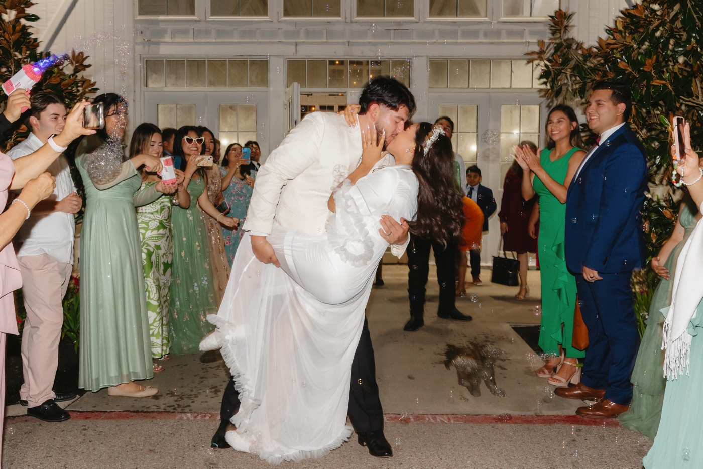 Grand wedding exit with bubbles at The Springs in Wallisville
